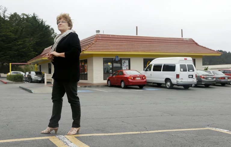 Kathryn Slater-Carter poses for photographs at a McDonald's restaurant she owns in Daly City, Calif., Tuesday, Sept. 2, 2014. Slater-Carter spearheaded a bill in California that could soon give franchisees greater protections in their dealings with franchisers. Around the country, union organizers are pushing to make McDonald's take responsibility for how workers are treated at its franchised restaurants.  (AP Photo/Jeff Chiu)