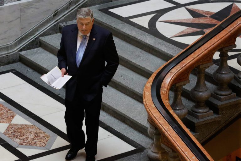 Illinois state Sen. Kirk Dillard, R-Westmont, leaves the Senate chambers at the state Capitol Friday, May  30, 2014, in Springfield Ill. (AP Photo/Seth Perlman)