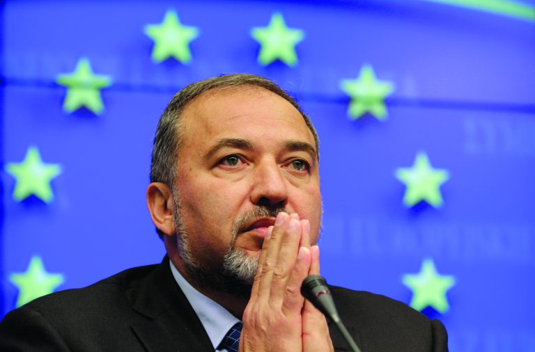 FILE - In this Tuesday, Feb. 22, 2011 file photo, Israel's Foreign minister Avigdor Lieberman attends a media briefing at the ned of an EU-Israel Association Council at the European Council building in Brussels. Lieberman sent a letter to international Mideast peace mediators calling Abbas an 