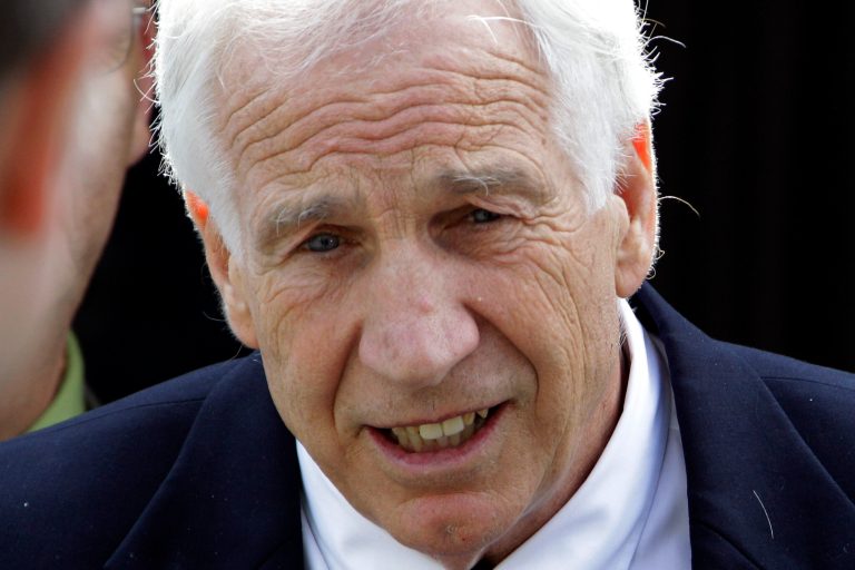   Former Penn State University assistant football coach Jerry Sandusky leaves the Centre County Courthouse after the second day of testimony at his trial in Bellefonte, Pa., Monday, June 11, 2012. Sandusky is accused of 52 counts of child sexual abuse involving 10 boys over a period of 15 years in Bellefonte, Pa., Monday, June 11, 2012. (AP Photo/Gene J. Puskar)  