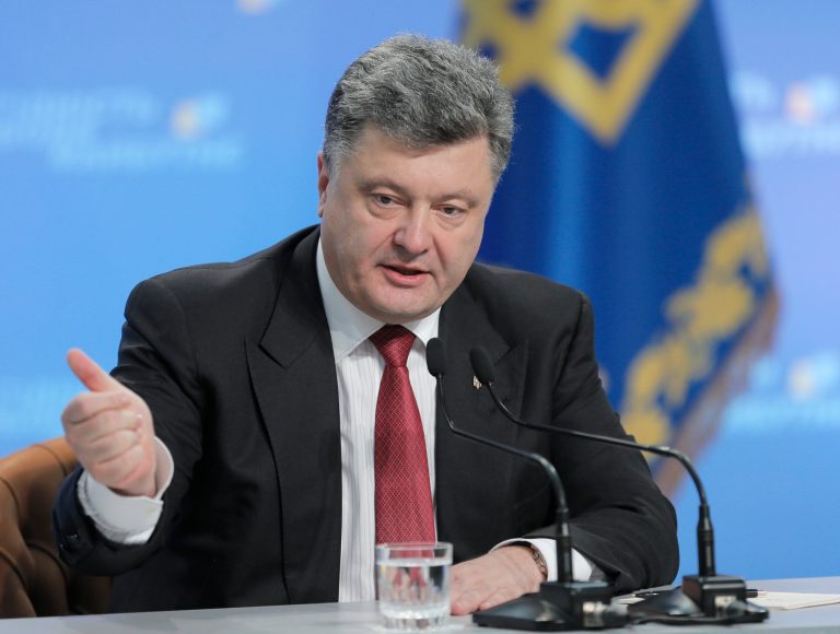 Ukrainian President Petro Poroshenko gestures during a press conference in Kiev, Ukraine, Thursday, Sept. 25, 2014. Poroshenko gave his first major news conference since taking office in June. (AP Photo/Efrem Lukatsky)
