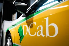 Vince Gray shows off colors for future D.C. cabs