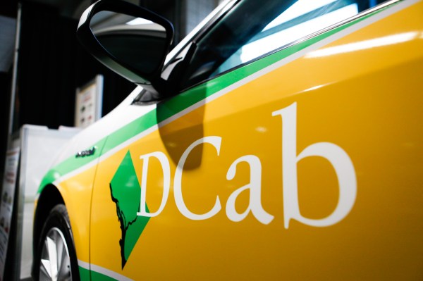 Vince Gray shows off colors for future D.C. cabs