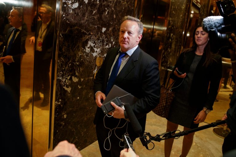Sean Spicer would mow Trump's lawn. (AP Photo/ Evan Vucci)