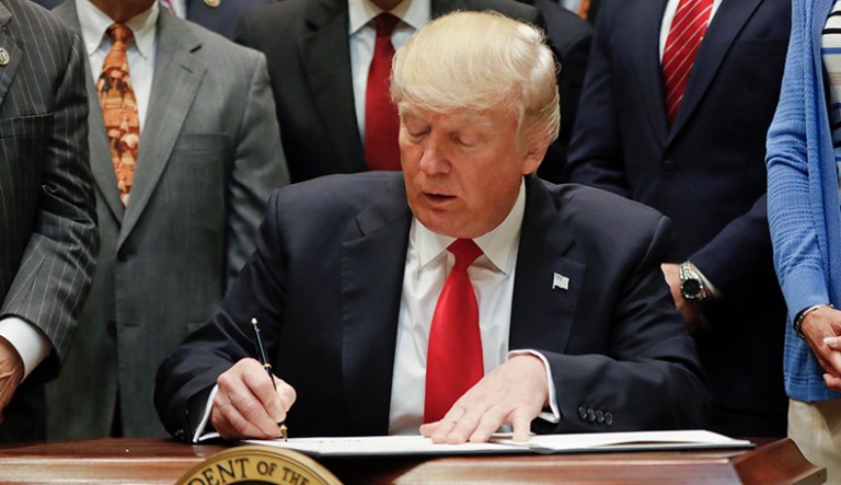 President Trump signed an executive order Friday that begins a review of all regulations preventing energy development at sea. (AP Photo/Pablo Martinez Monsivais)