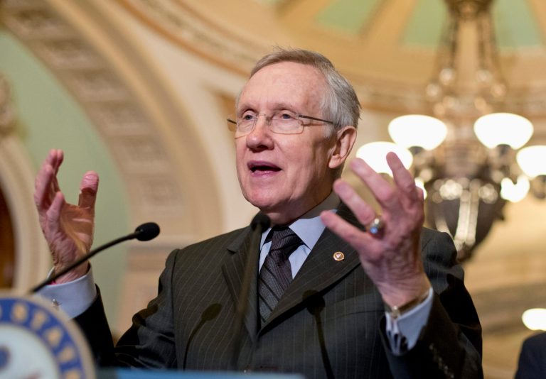   FILE - In this July 30, 2013 file photo, Senate Majority Leader Harry Reid of Nev. speaks with reporters on Capitol Hill in Washington. Senate Republicans Thursday killed a $54 billion funding bill for transportation, housing and community development grants because it exceeded the punishing spending limits required under automatic budget cuts that are the product of Washington's failure to deal with its fiscal problems. (AP Photo/J. Scott Applewhite, File)  