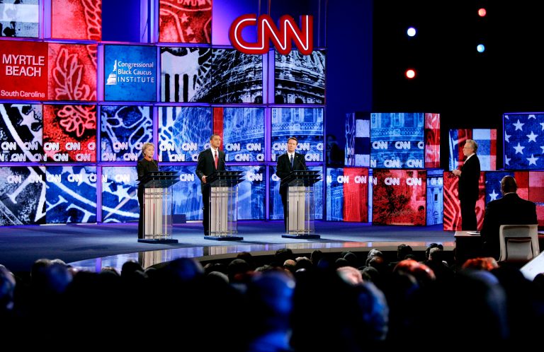 From left, Democratic presidential hopefuls then-Sen. Hillary Rodham Clinton, D-N.Y., then-Sen. Barack Obama, D-Ill., and former Sen. John Edwards, D-N.C., participate in a Democratic presidential debate in Myrtle Beach, S.C., Monday, Jan. 21, 2008. At right is CNN's Wolf Blitzer. (AP Photo/Mary Ann Chastain)