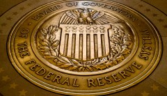 Fed official hints at tapering bond purchases as economy heats up