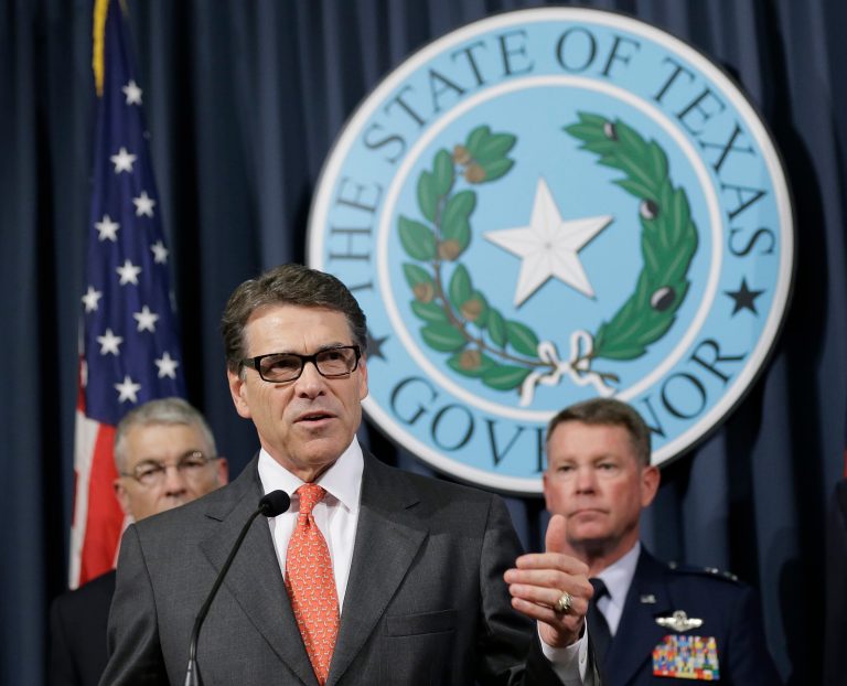 Gov. Rick Perry speaks during a news conference in the Governor's press room, Monday, July 21, 2014, in Austin, Texas. (AP Photo/Eric Gay)