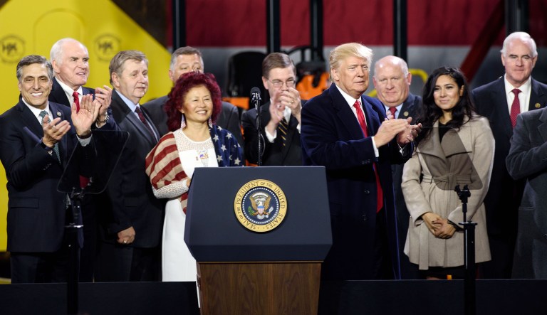 President Trump stands with many of the Pennsylvania delegation during an official visit at H&K Equipment, a rental and sales company for specialized material handling solutions in Coraopolis, Pa., on Jan. 18, 2018. (Photo by Justin Merriman for the Washington Examiner)
