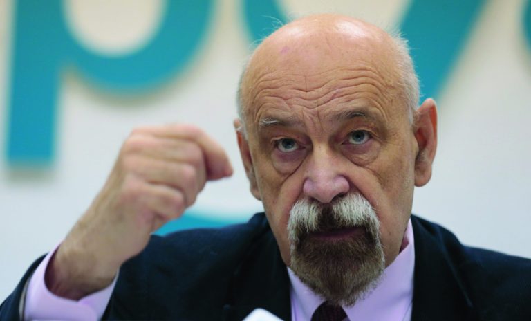 Russian prisoners rights activist Valery Borschev gestures during a news conference in Moscow, Russia, on Wednesday, Oct. 24, 2012. A respected Russian group of human rights activists has backed claims made by jailed opposition activist Leonid Razvozzhayev that he was tortured into confessing to plotting riots. (AP Photo/Ivan Sekretarev)