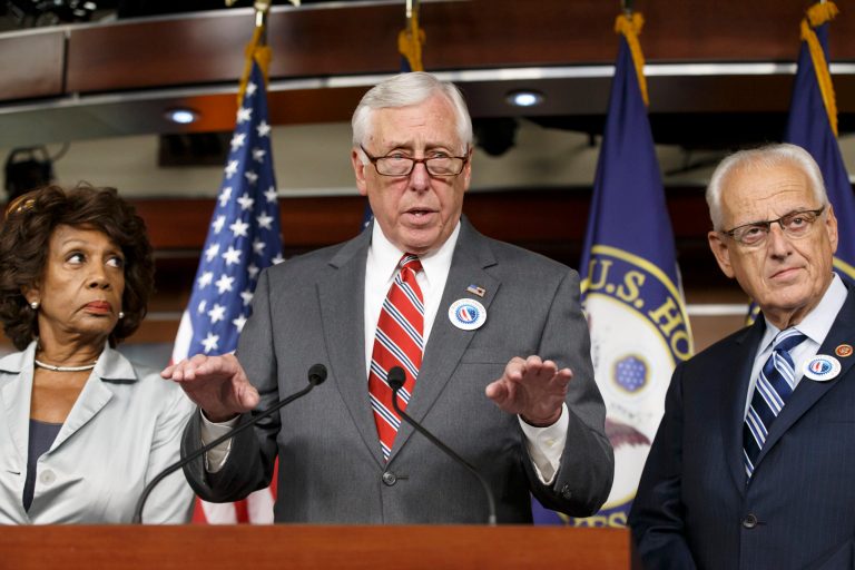 Congress cooperates _ and fights _ as recess nears