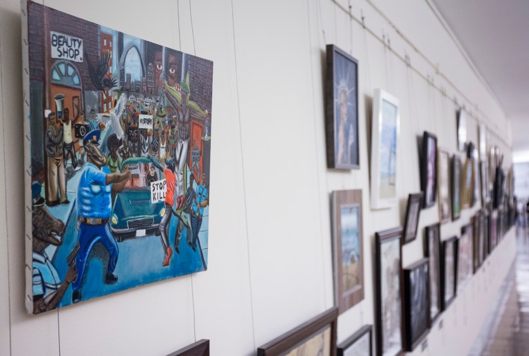 The painting, done by a black Missouri teenager, was one of hundreds of winners of the Congressional Art Competition. (AP Photo/Zach Gibson)