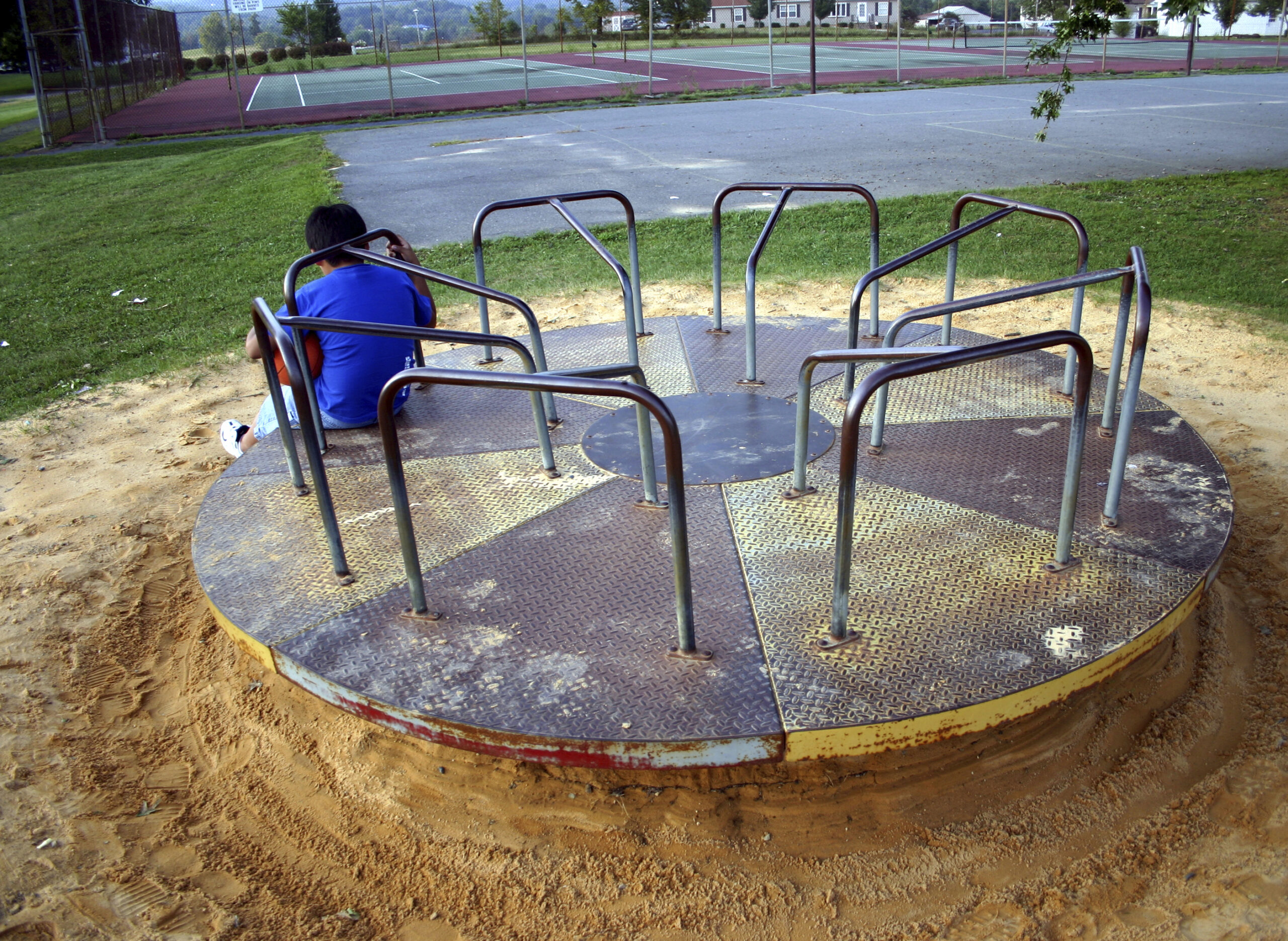 Neighborliness: Checking on an unattended child is okay, calling the cops is not