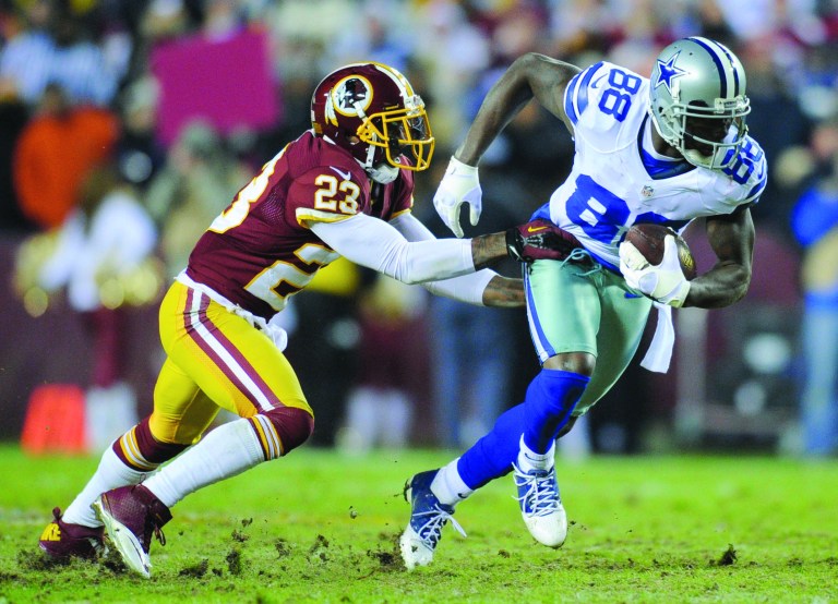 Nick Wass/AP
DeAngelo Hall and the Redskins held the Cowboys' Dez Bryant out of the end zone for the first time in eight games.