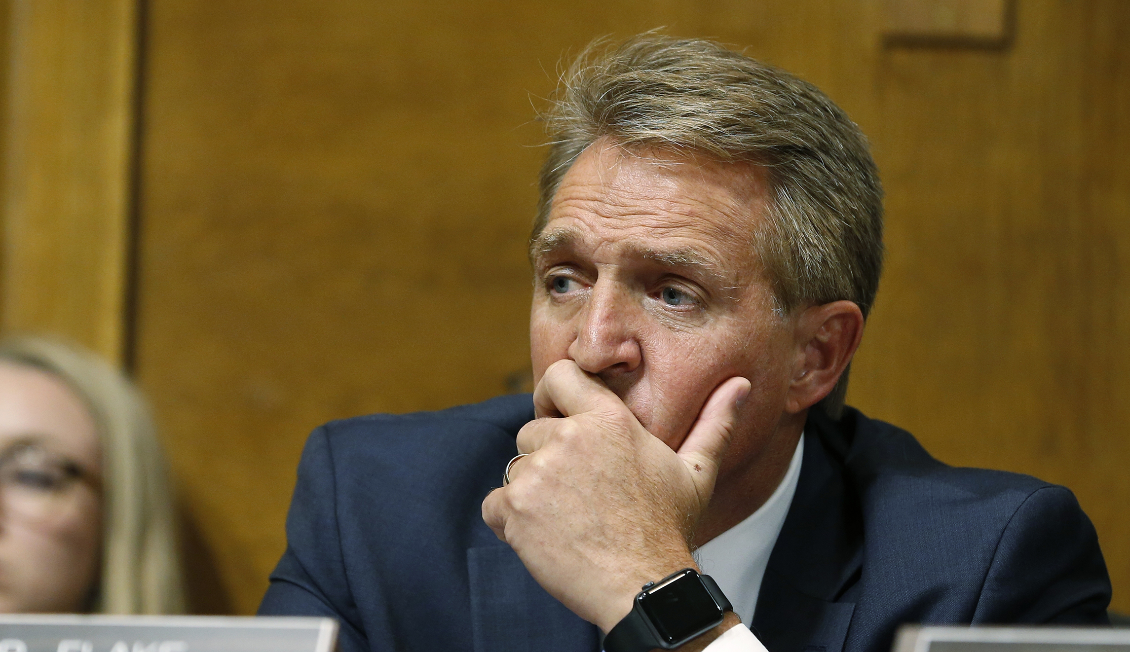 Flake confronted by sexual assault survivors after announcing he will back Kavanaugh