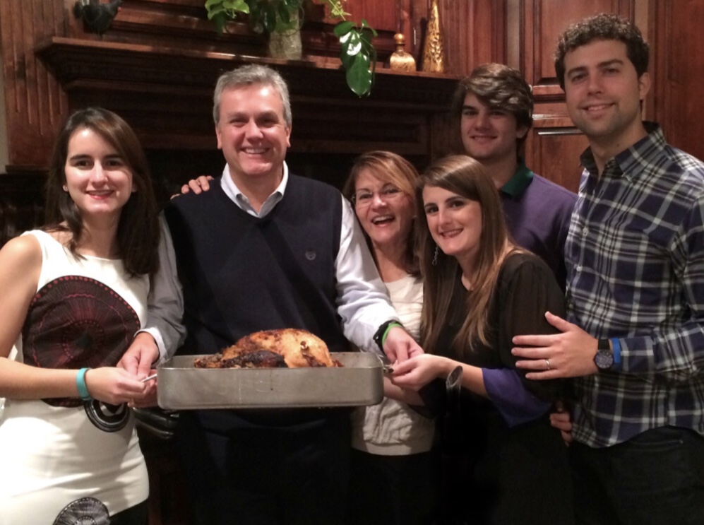 Tomeau Vadell is flanked by his daughters Cristina (left) and daughter Veronica (right) on Thanksgiving 2015. His wife Dennysse, son Diego, and son-in-law also are pictured.