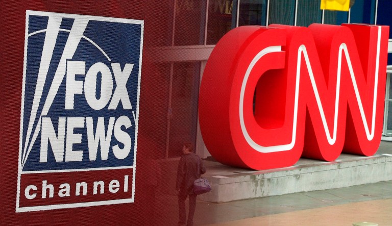 Fox News and CNN logos are seen.
