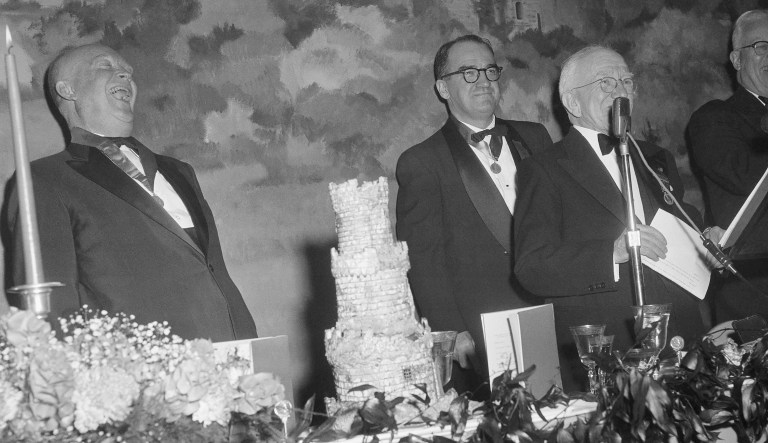 If there is any doubt about the brand of Irish humor President Sean O' Kelly hands out just take a look at President Dwight  Eisenhower. The chief executive reared back with laughter as the President of Ireland entertained the Friendly Sons of St. Patrick on March 17, 1959 with sons of his Irish jokes. In rear is toastmaster, John Reilly. 