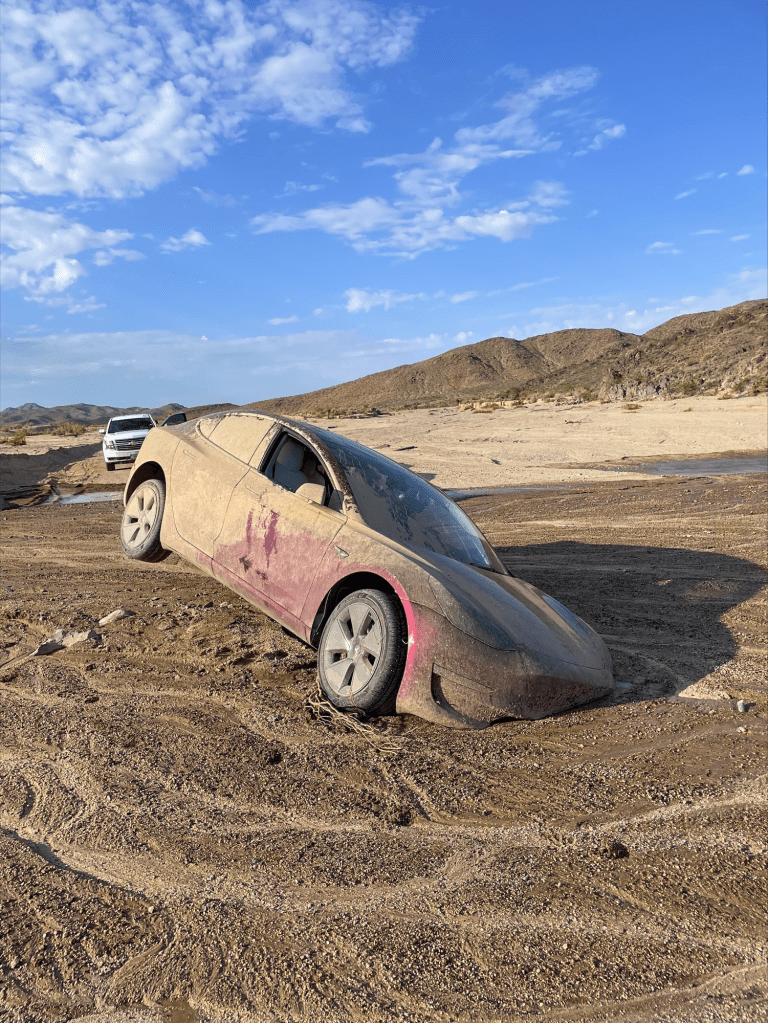 This traveler relied on a GPS guidance system, bypassed closures and hazards, and became stuck in a wash on North Kelbaker Road. The occupants were okay, but the car had to be abandoned and later towed away.