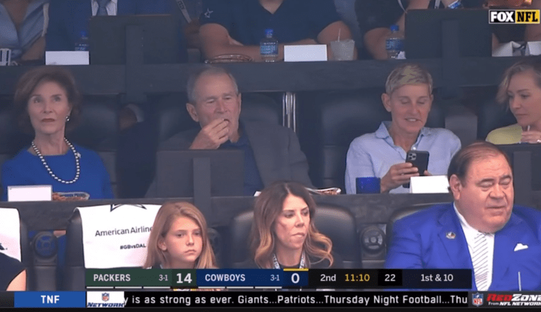 Ellen DeGeneres and former President George W. Bush sitting at the Dallas Cowboys game Oct. 6.