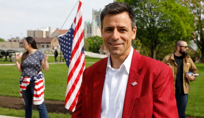 Ryan Kelly, Republication candidate for governor, attends a rally in Lansing, Michigan, on May 15, 2021.