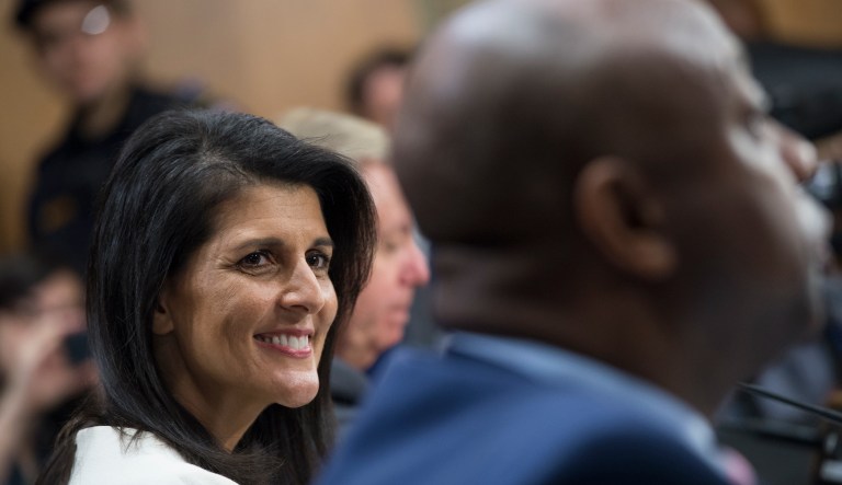 Gov. Nikki Haley, R-S.C., President Trump's nominee to be U.S. ambassador to the United Nations, is introduced by Sens. Lindsey Graham, R-S.C., center, and Tim Scott, R-S.C., during her Senate Foreign Relations Committee confirmation hearing.