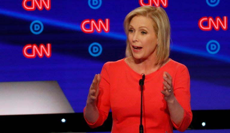 Sen. Michael Bennet, D-Colo., and Sen. Kirsten Gillibrand, D-N.Y., participate in the second of two Democratic presidential primary debates hosted by CNN Wednesday, July 31, 2019, in the Fox Theatre in Detroit.