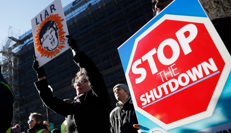 Union members and other federal employees rally to call for an end to the partial government shutdown, Thursday, Jan. 10, 2019 at AFL-CIO Headquarters in Washington.