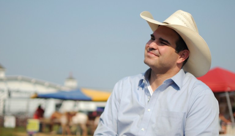 In this Aug. 10, 2018, photo, Democratic governor candidate Billie Sutton campaigns at a fair in Sioux Falls, S.D.