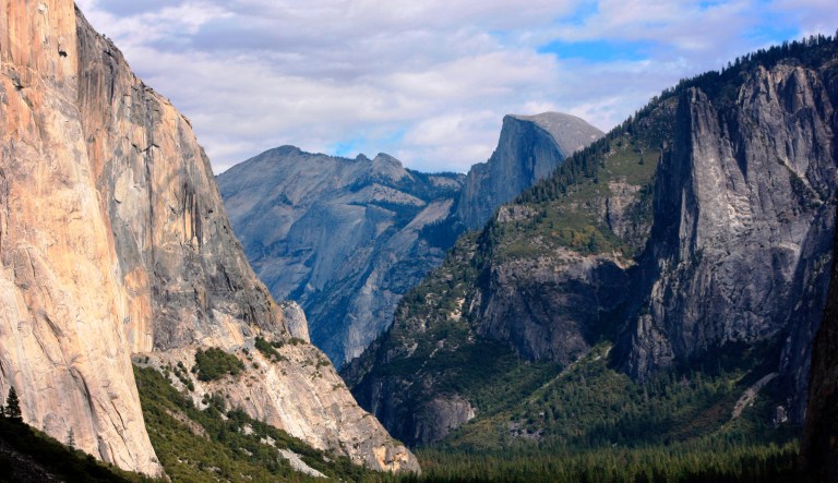FILE - This Oct. 2, 2013, file photo, shows a view seen on the way to Glacier Point trail in the Yosemite National Park, Calif. Sexual harassment, bullying and other misconduct is rampant among employees at national parks across the country, including at iconic sites such as Yosemite, Yellowstone and the Grand Canyon, a congressional committee was told Sept. 22, 2016. At Yosemite, at least 18 employees have come forward with allegations of harassment or other misconduct so severe that a recent report labeled working conditions at the park "toxic." 