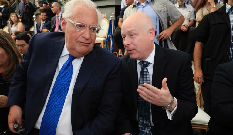 FILE - In this June 30, 2019 file photo, U.S. Ambassador to Israel David Friedman, left, and White House Mideast envoy Jason Greenblatt attend the opening of an ancient road at the City of David, a popular archaeological and tourist site in the Palestinian neighborhood of Silwan in east Jerusalem.  