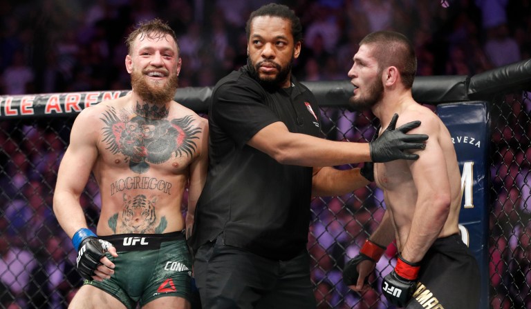 Conor McGregor, left, fights Khabib Nurmagomedov during a UFC 229 mixed martial arts bout Saturday, Oct. 6, 2018, in Las Vegas.