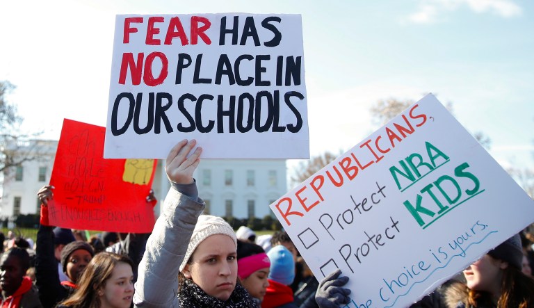 Students rally in front of the White House in Washington, Wednesday, March 14, 2018. Students walked out of school to protest gun violence in the biggest demonstration yet of the student activism that has emerged in response to last month's massacre of 17 people at Florida's Marjory Stoneman Douglas High School.