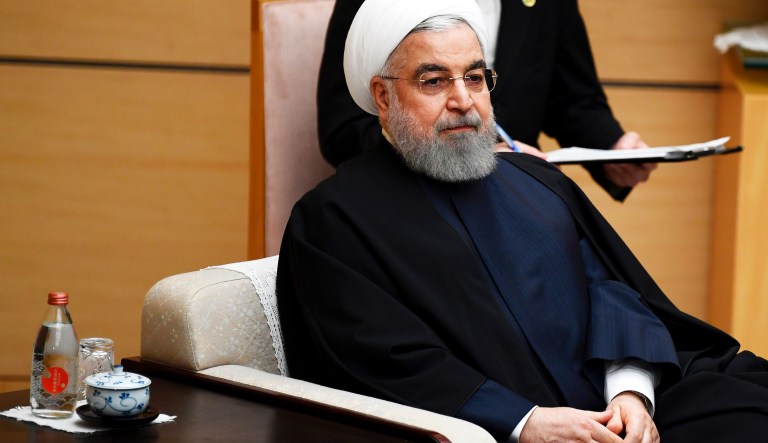 Iranian President Hassan Rouhani and Japanese Prime Minister Shinzo Abe (unseen) during a meeting at the prime minister's office in Tokyo on December 20, 2019.