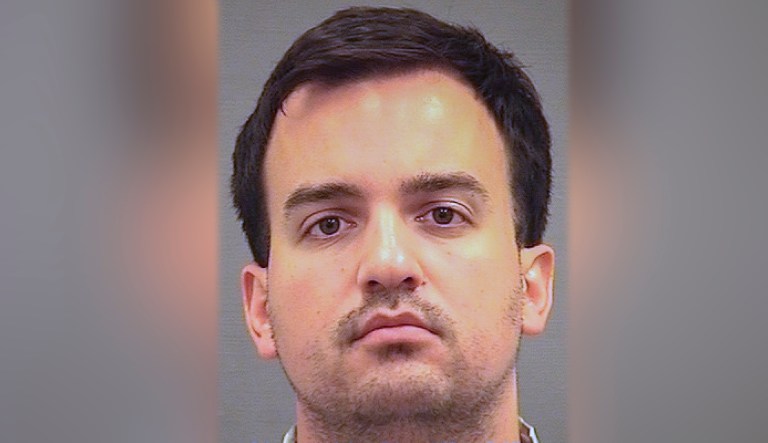 This image provided by the Alexandria Sheriff's Office shows Henry Kyle Frese. Frese, a Defense Intelligence Agency official was arrested Wednesday and charged with leaking classified intelligence information to two journalists, including a reporter he was dating, the Justice Department said. Frese was arrested by the FBI when he arrived at work at a DIA facility in Virginia.