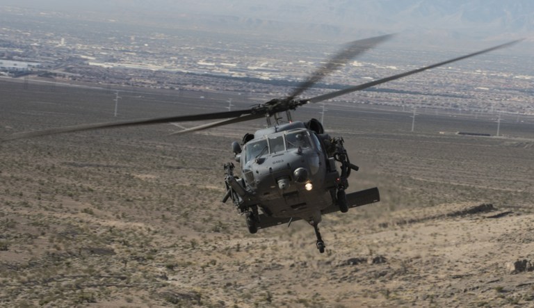 An HH-60G Pave Hawk helicopter, assigned to the 66th Rescue Squadron, flies during training on Nellis Air Force Base, Nevada, Feb. 22, 2018. 
