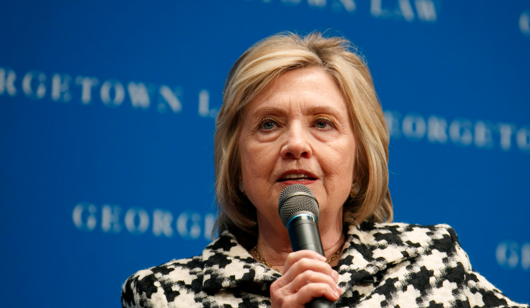 FILE - In this file photo dated Wednesday, Oct. 30, 2019, former U.S. Secretary of State Hillary Clinton speaks at Georgetown Law's second annual Ruth Bader Ginsburg Lecture, in Washington. Clinton told the BBC on Tuesday Nov. 12, 2019, that she's âdumbfoundedâ the U.K. government has failed to release a report on Russian influence in British politics as the country prepares for national elections on Dec 12. (AP Photo/Jacquelyn Martin, FILE)
