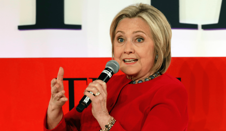 FILE - In this April 23, 2019, file photo, Hillary Clinton speaks during the TIME 100 Summit, in New York. Clinton is popping up in presidential politics again, and some Democrats are wary even as they praise her role as a senior party leader. (AP Photo/Richard Drew, File)