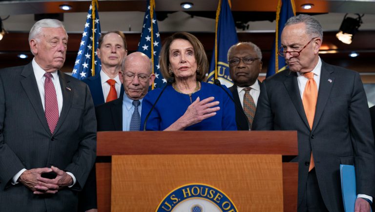 Speaker of the House Nancy Pelosi, D-Calif., center, Senate Minority Leader Chuck Schumer, D-N.Y., right, and other congressional leaders, react to a failed meeting with President Donald Trump at the White House on infrastructure, at the Capitol in Washington, Wednesday, May 22, 2019.  From left are House Majority Leader Steny Hoyer, D-Md., Sen. Ron Wyden, D-Ore., House Transportation and Infrastructure Committee Chair Peter DeFazio, D-Ore., Pelosi, House Majority Whip James E. Clyburn, D-S.C., and Schumer.