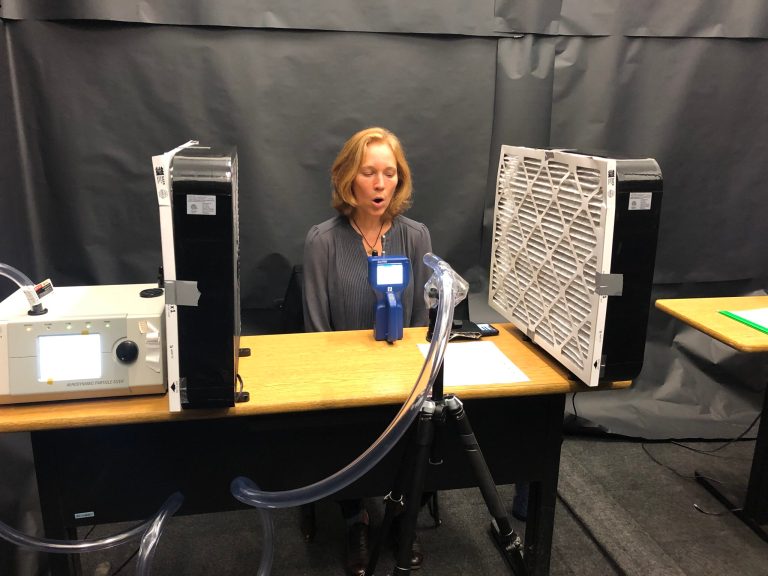 Soprano Allison Hughes, director of the College Park Chorale, participates in tests at the University of Maryland's City@UMD laboratory in College Park, MD. A research team led by UMD professors Jelena Srebric and Donald Milton is developing ways to reduce the risk of COVID-19 transmission during public events, such as musical performances or political debates.