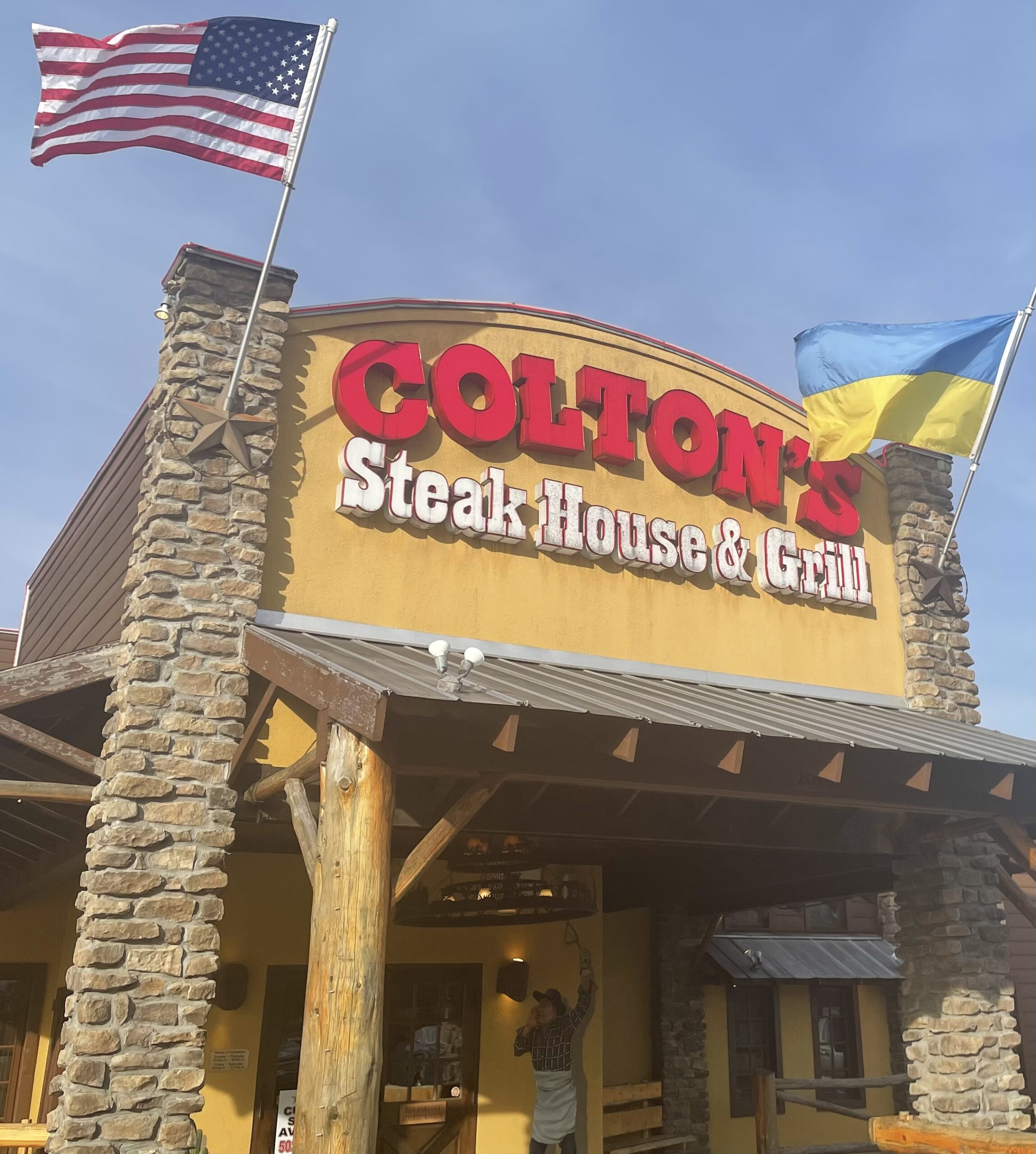 Restaurant manager says he received backlash after raising Ukrainian flag