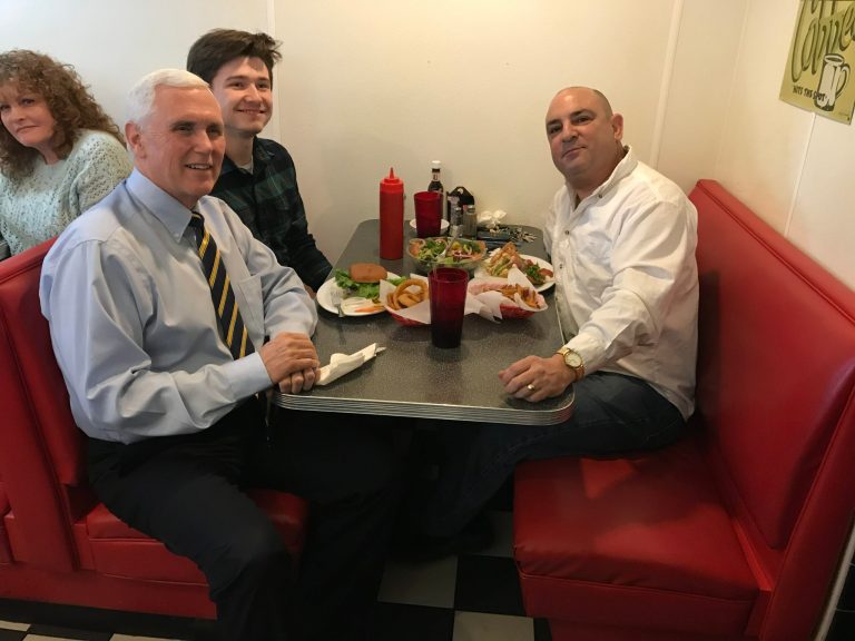 Vice President Mike Pence greets patrons at the Fleetwood Diner in Lansing, Michigan. 