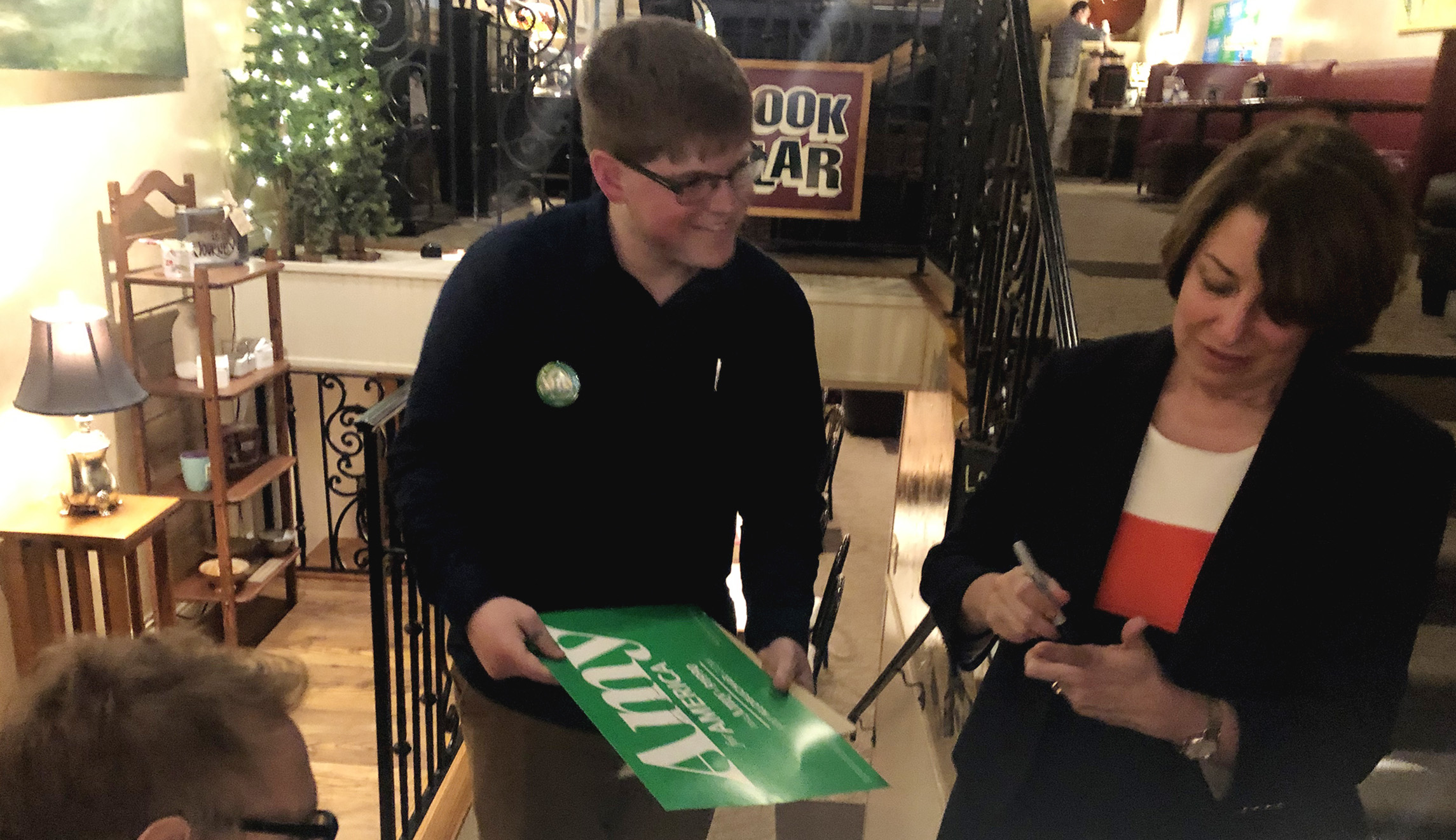 Gillibrand and Klobuchar share Iowa coffeehouse for separate campaign events