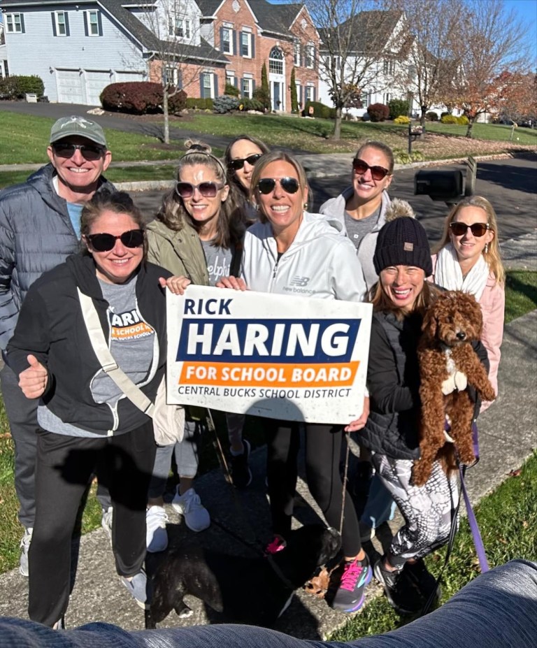 Democratic Bucks County school board candidate Rick Haring campaigning for the seat he won Tuesday night in a historic night for Democrats in this bellwether county. 