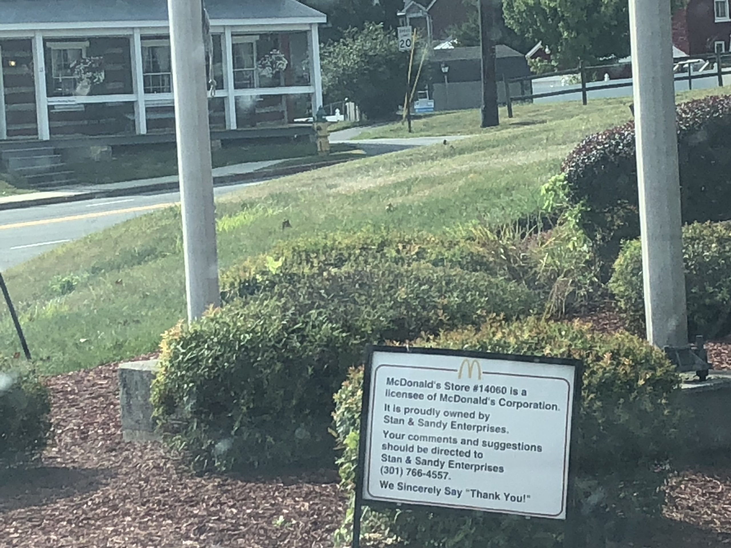 A sign is seen near a McDonald’s building in Clear Spring, Maryland, a franchise store owned by Stan Neil.