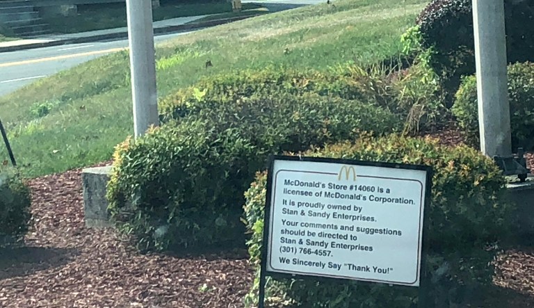 A sign is seen near a McDonaldâs building in Clear Spring, Maryland, a franchise store owned by Stan Neil.