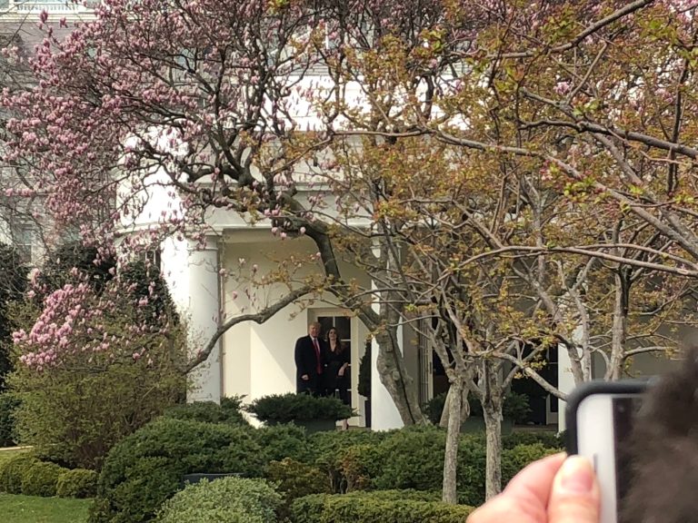 President Trump and outgoing White House communications director Hope Hicks pose for a photo on her last day in the White House.