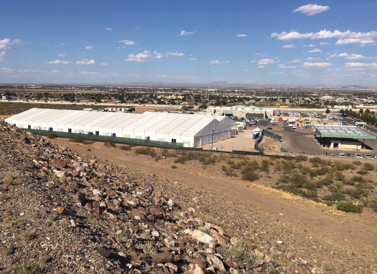 The temporary white holding tents were installed in the back of the El Paso Sector's El Paso Station.