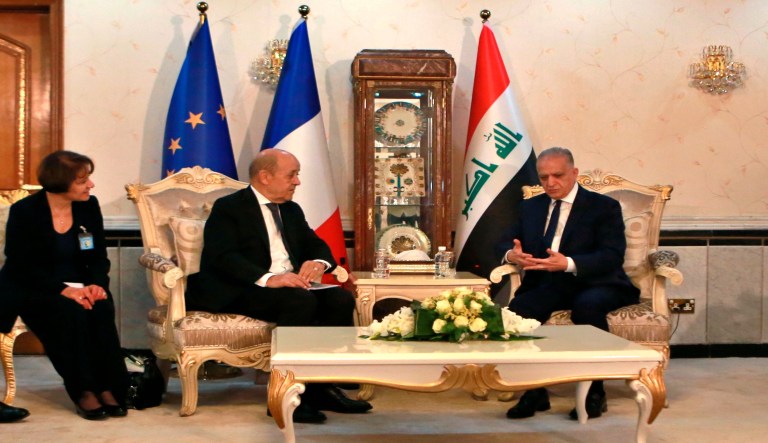 Iraqi Foreign Minister Mohamed Alhakim, right, meets with his visiting French counterpart Jean Yves Le Drian at the Ministry of Foreign Affairs in Baghdad, Iraq, Thursday, Oct. 17, 2019. 